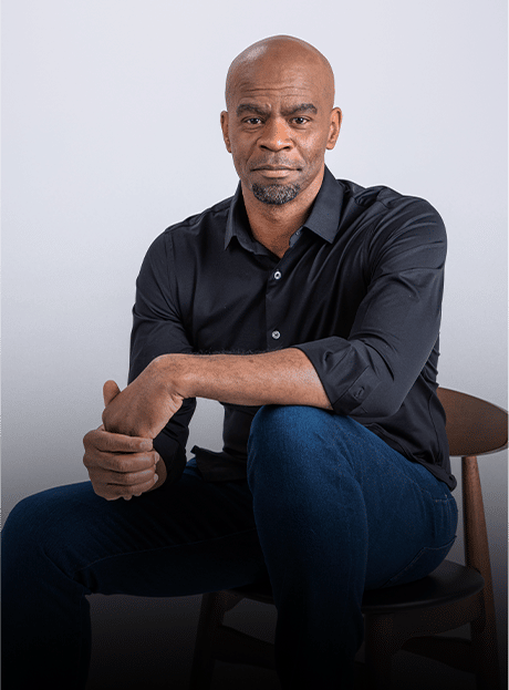 Comedian Michael jr. sitting on a chair